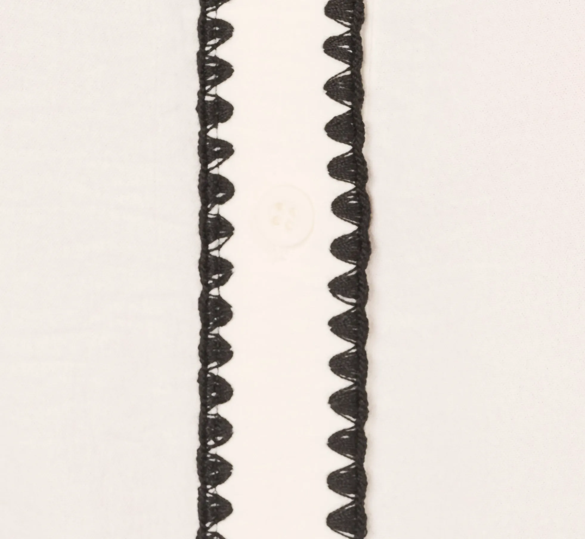 Long Sleeve Button Down Top With Embroidered Details In Ivory Black